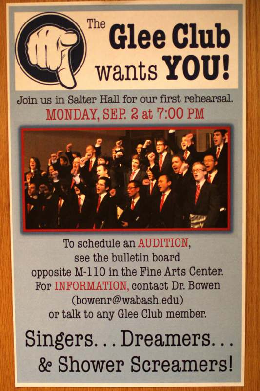 a poster with a group of men in suits