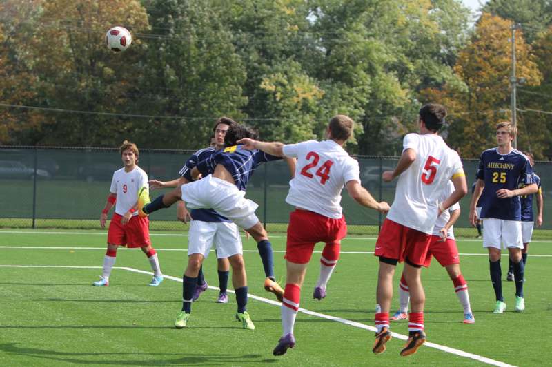 a group of men playing football