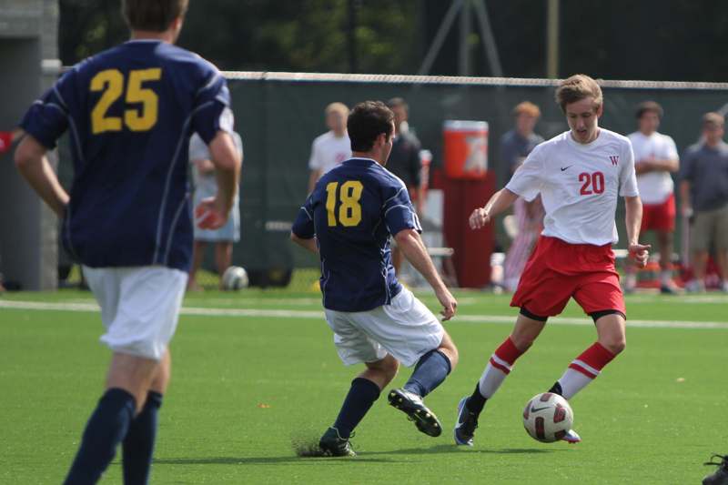 a group of men playing football