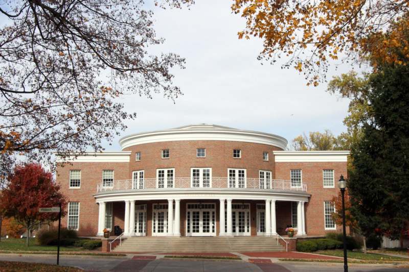 a large brick building with columns