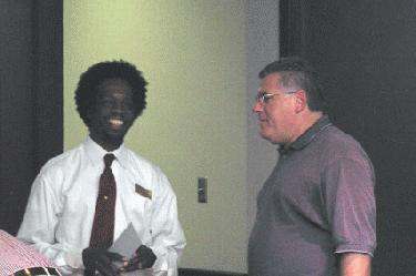 a man talking to a man
