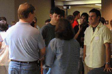 a group of people standing in a room