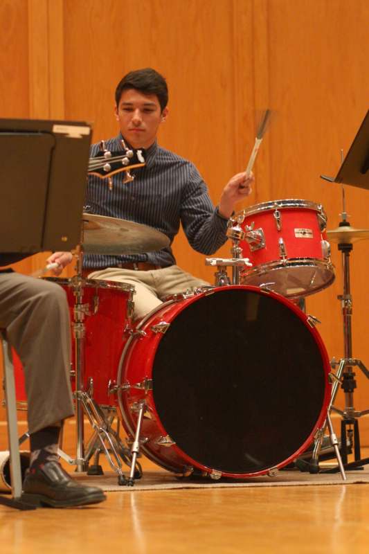 a man playing a drum set