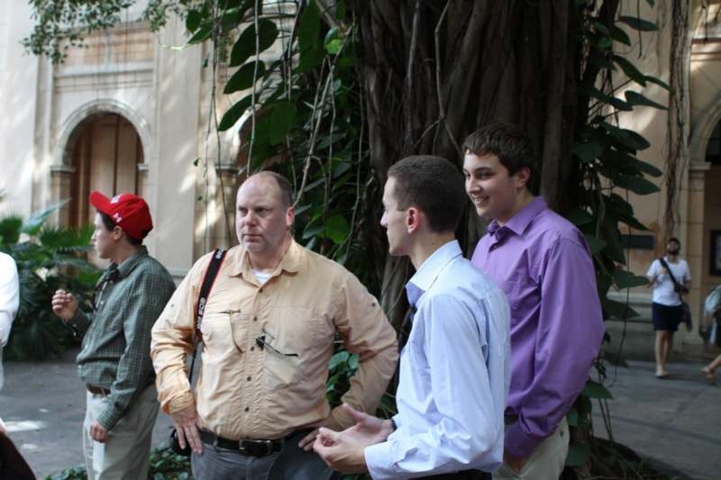 a group of men standing outside