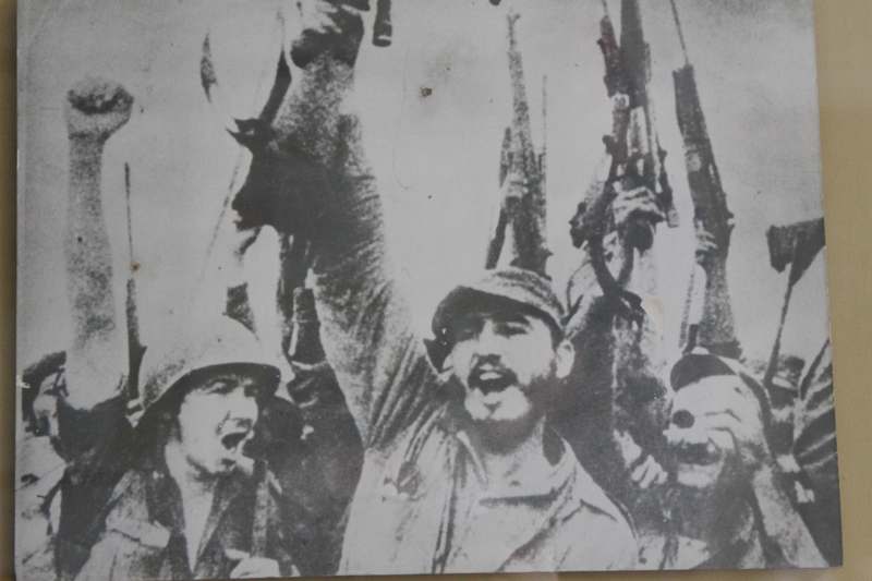 a group of men holding guns