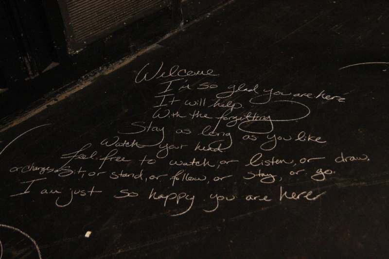 a black floor with writing on it