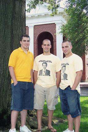a group of men standing in front of a building