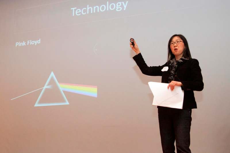 a woman giving a presentation
