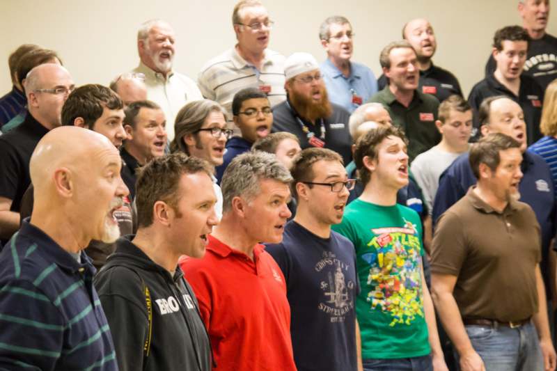 a group of people singing