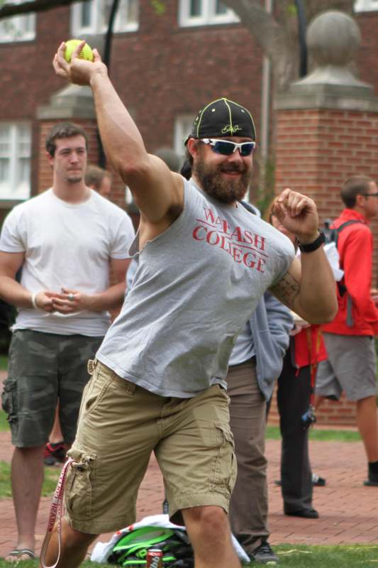 a man with a beard and sunglasses dancing