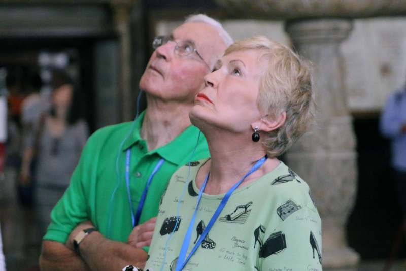 a man and woman looking up