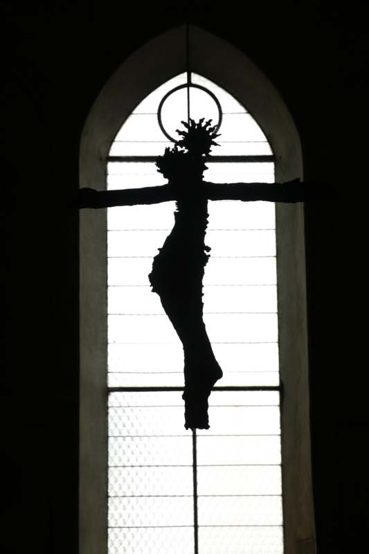 a silhouette of a crucifixion