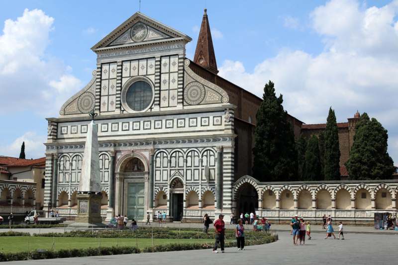Basilica of Santa Maria Novella with many people around it