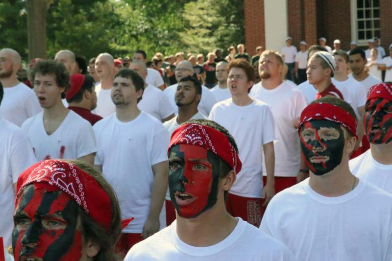 a group of people with face paint