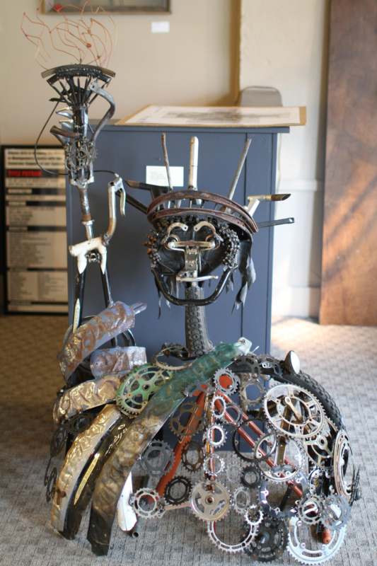 a sculpture made of metal parts