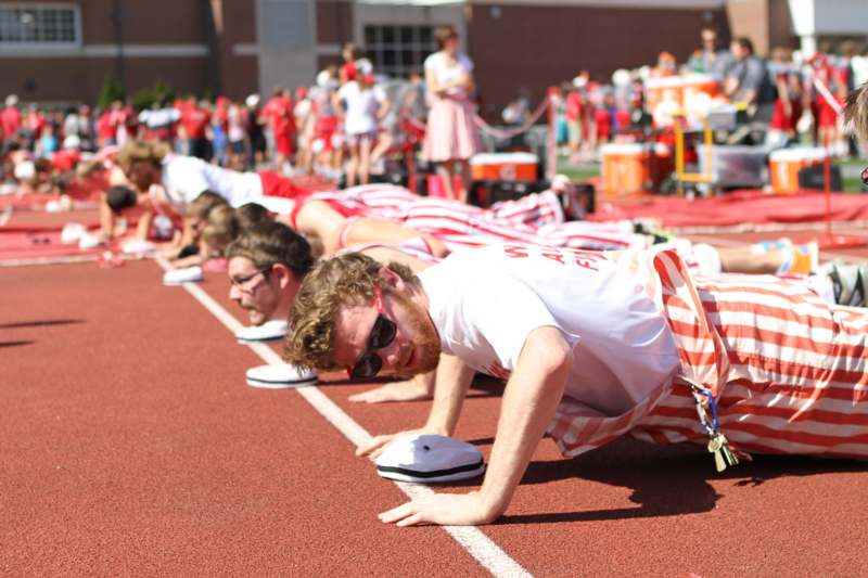 a group of people on a track