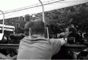 a group of men sitting at a table