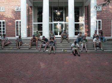 a group of people sitting on steps