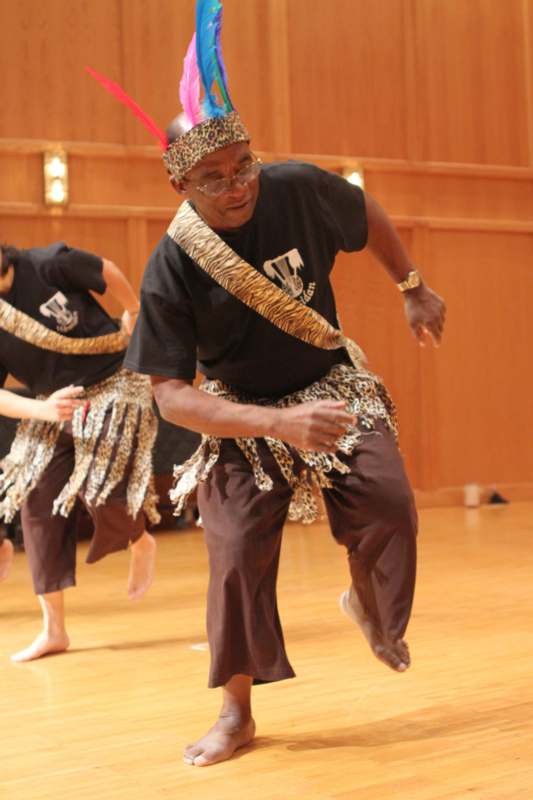 a man wearing a garment and dancing