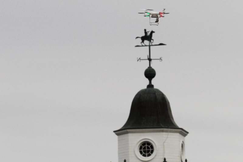 a drone flying over a building