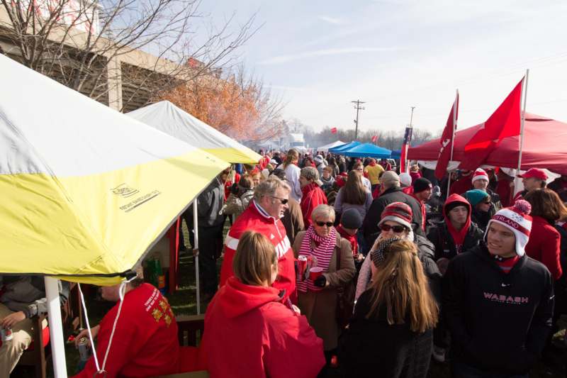 a crowd of people in red jackets
