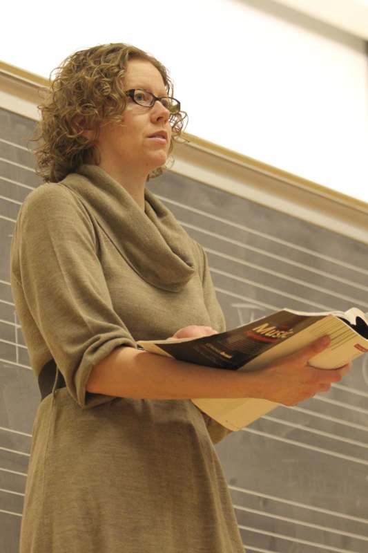 a woman holding a book
