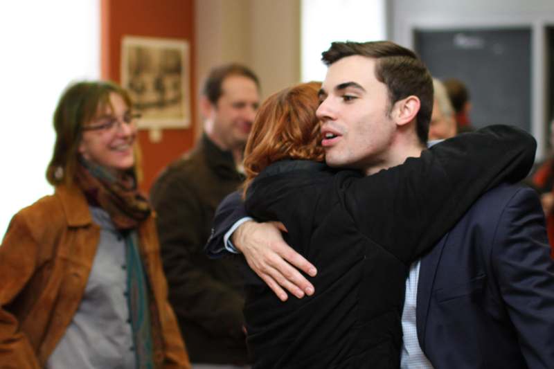 a man hugging a woman