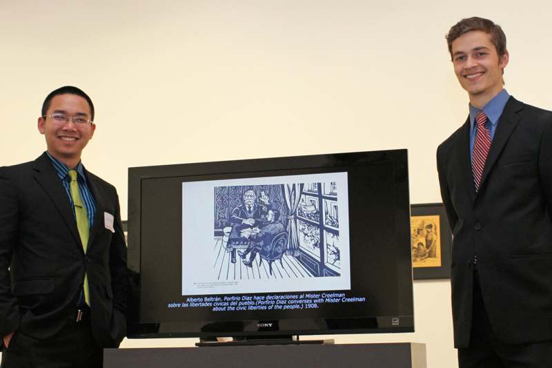 men standing next to a television