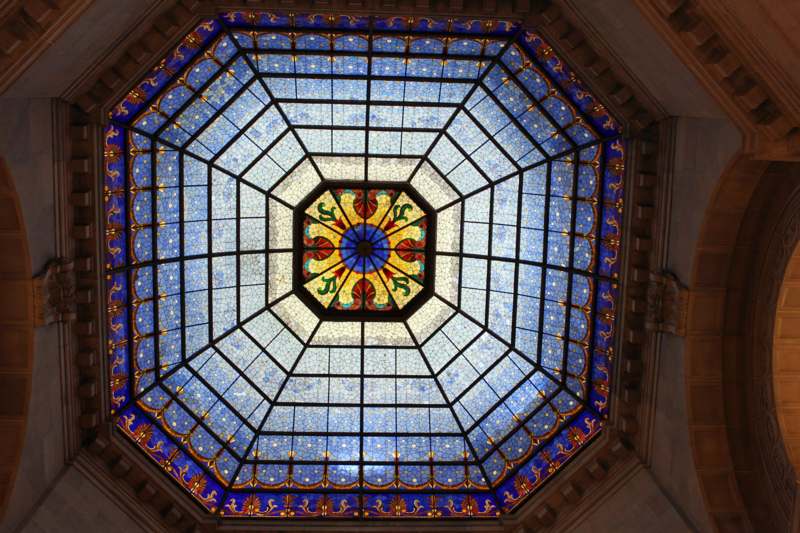 a stained glass window on a ceiling