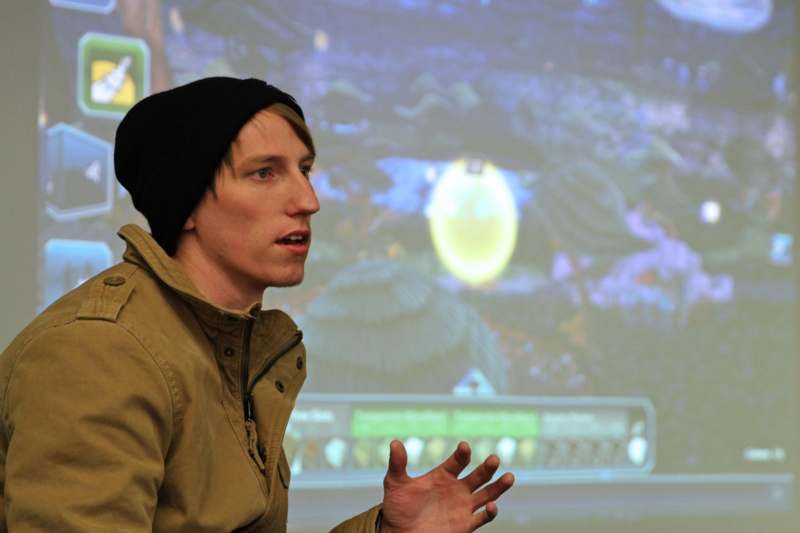a man in a beanie and jacket