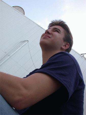a man looking up to the sky