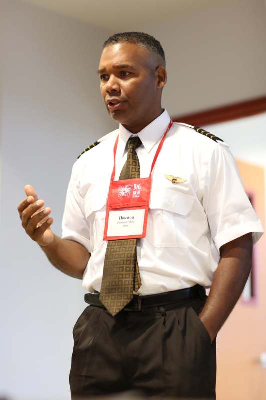 a man wearing a uniform and a necktie
