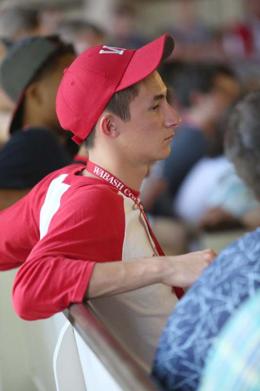 a man wearing a red hat and a red shirt