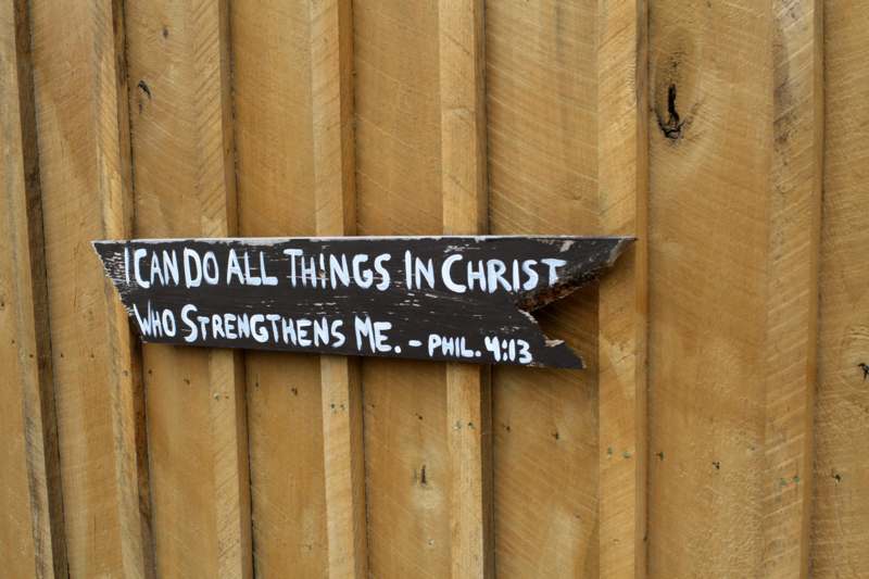 a sign on a fence