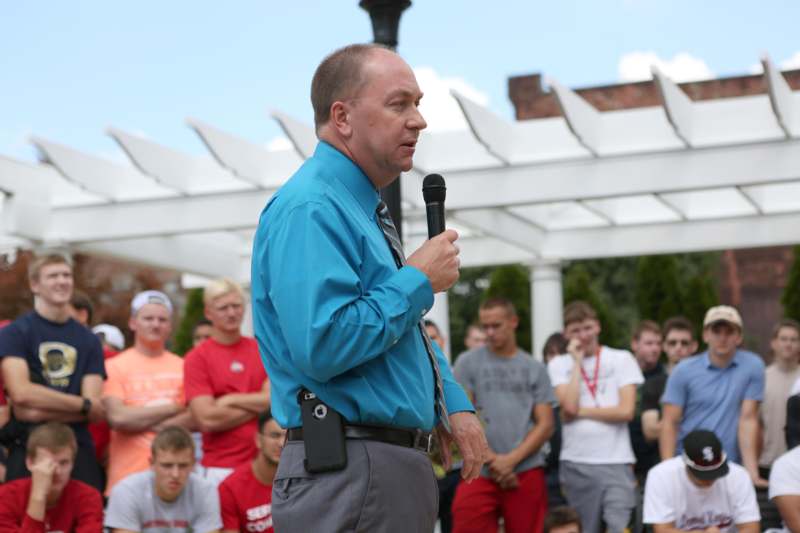 a man speaking into a microphone