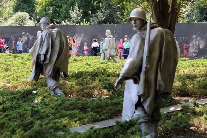 statues of men in military uniforms