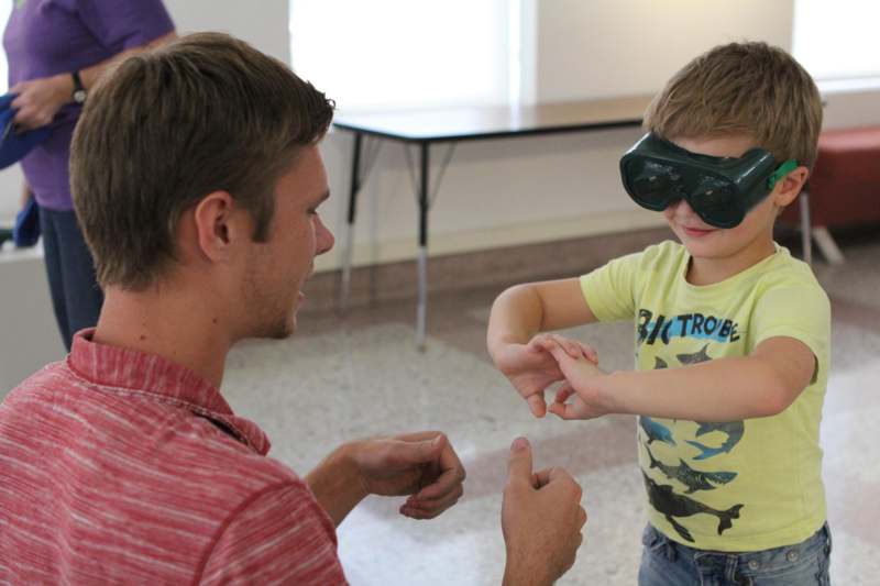 a man and a boy wearing goggles