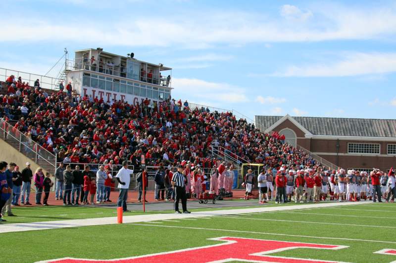 a crowd of people on a football field