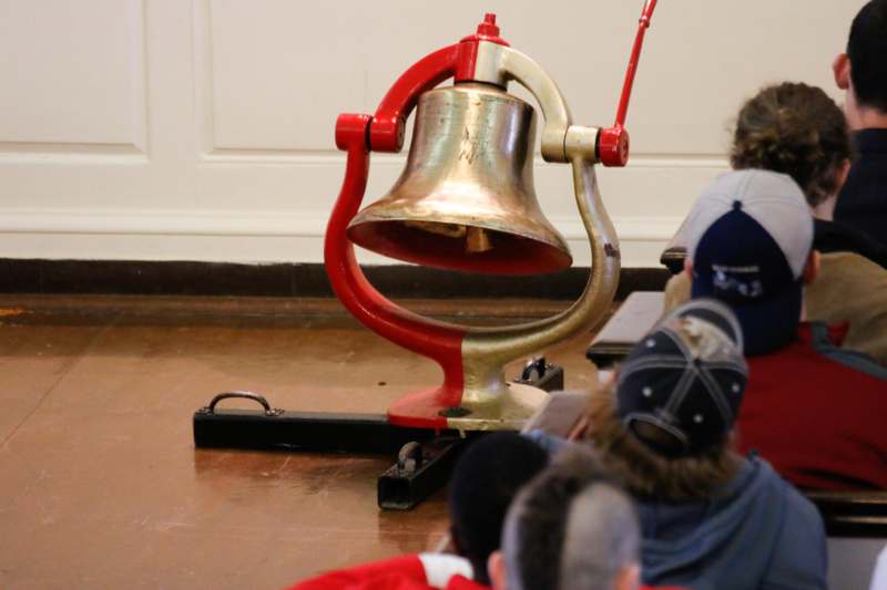 a bell on a stand