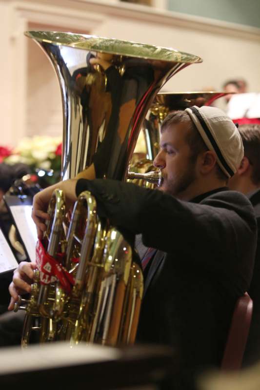 a man playing a horn