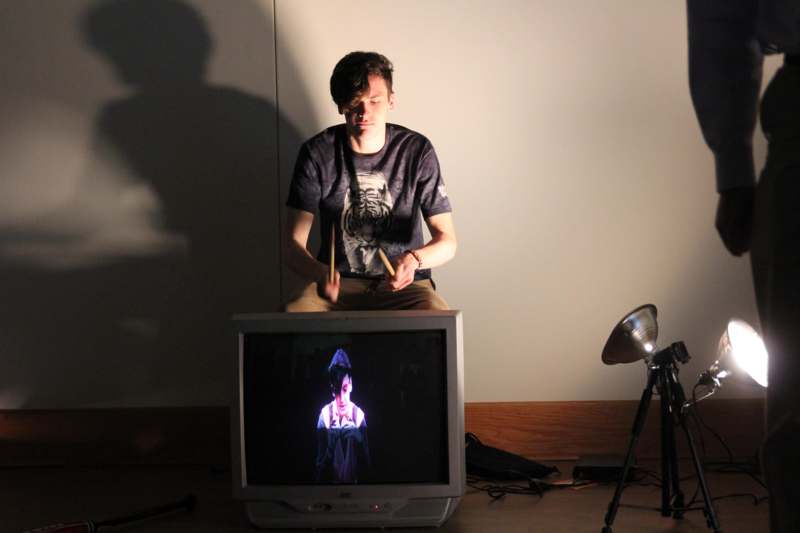 a man sitting on a television