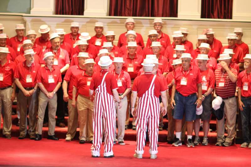 a group of men wearing matching outfits