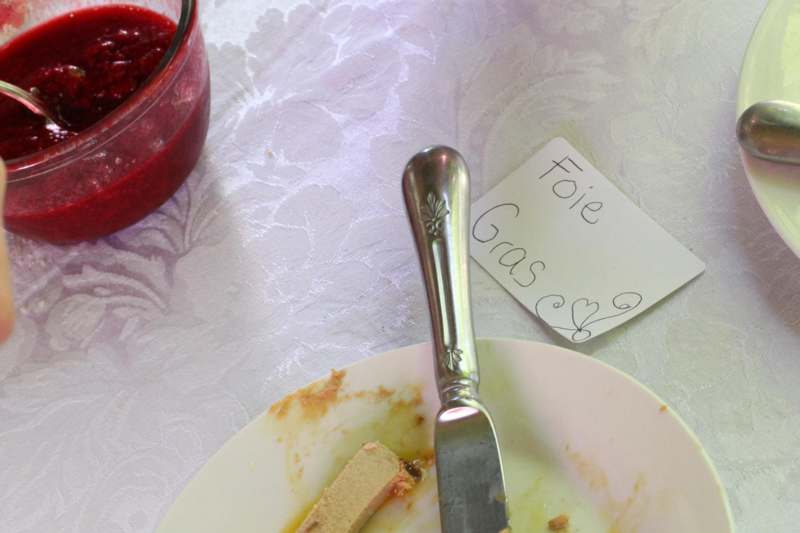 a plate with food on it and a card with a note