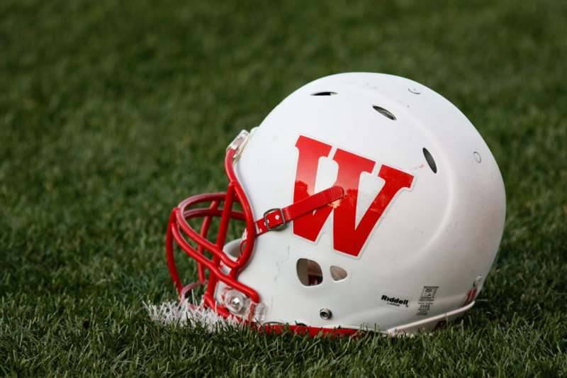 a football helmet on grass