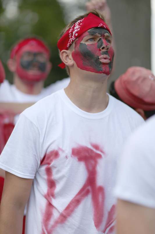 a man with paint on his face