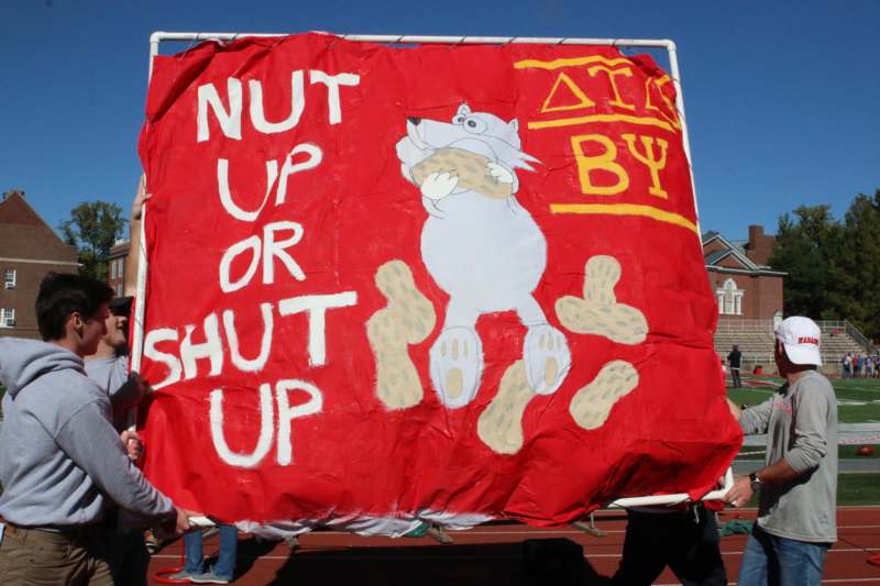 a person holding a banner