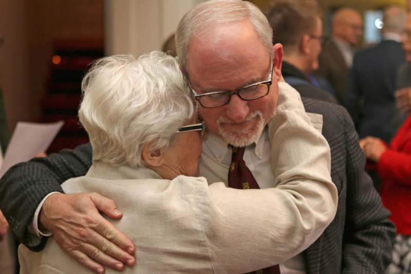 a man and woman hugging