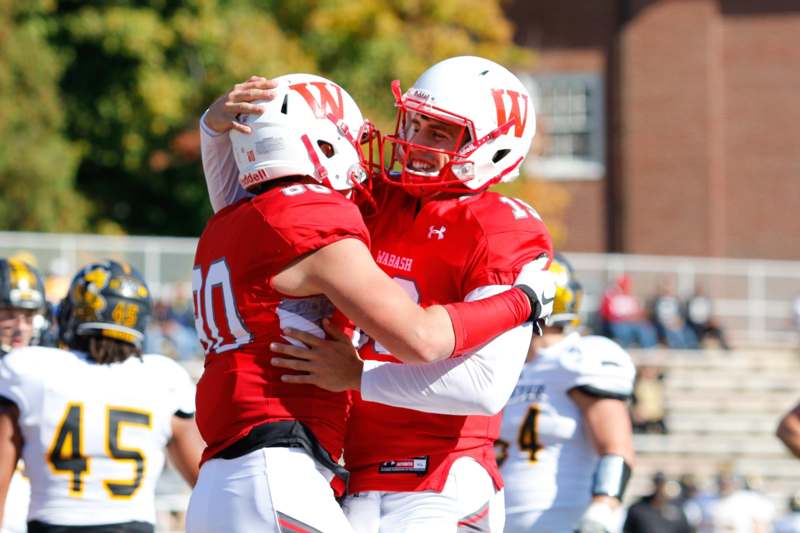 two football players hugging each other