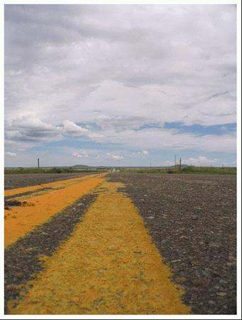 a road with yellow lines