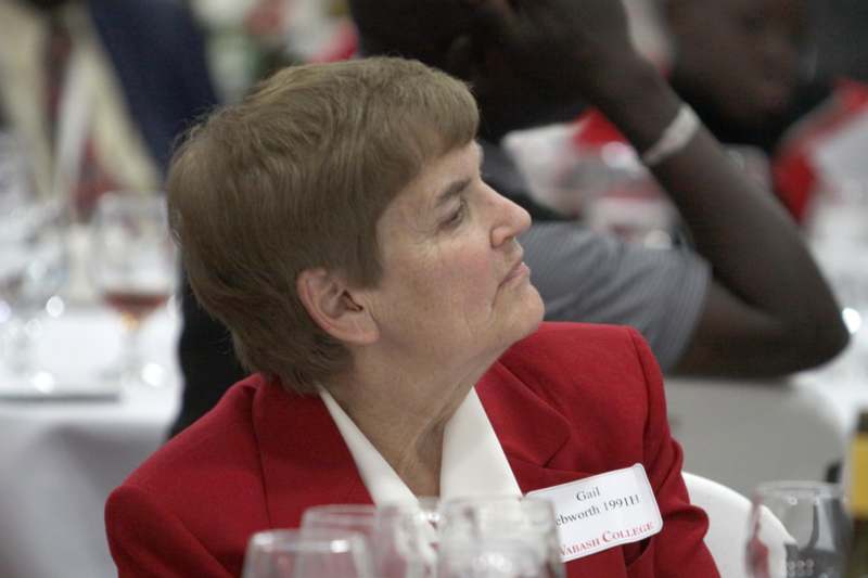 a woman in a red suit
